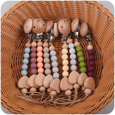 Ecotoys CozyClip™ | Seguro y elegante - Cadena de chupete de madera para bebés